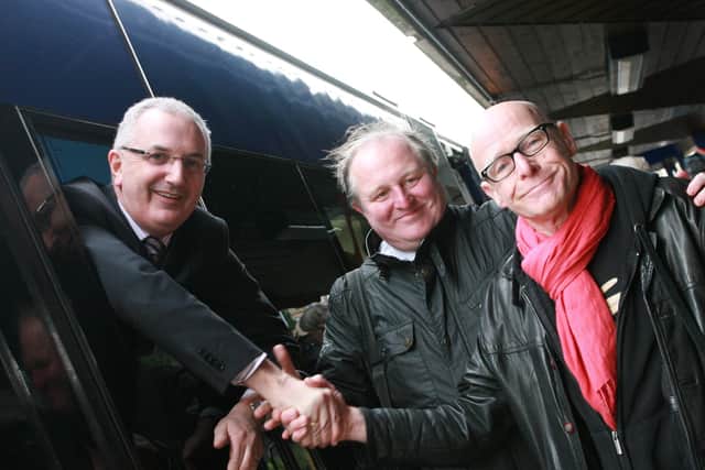 Then Minister Danny Kennedy with 'Into The West' campaigners Eamonn McCann Jim McBride around the time the Derry track relay was completed in 2013. 2703JM32
