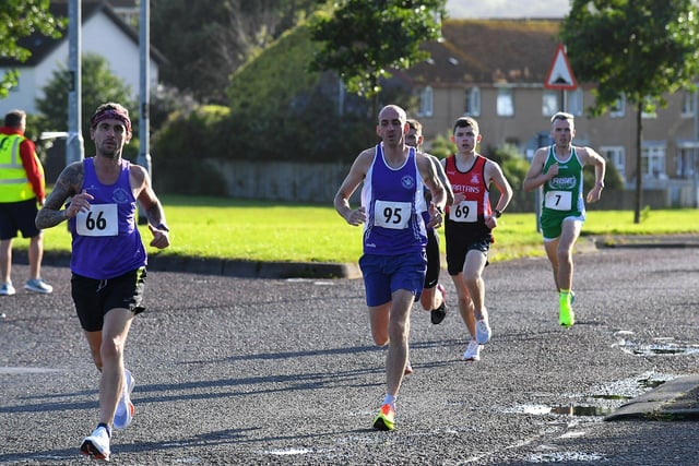 Foyle Valley's Sean O'Donnell (66) and Gary Brady (95), Spartans Aidan Healy (69) and Mark Tourish (7) Rise Running Club. Photo: George Sweeney