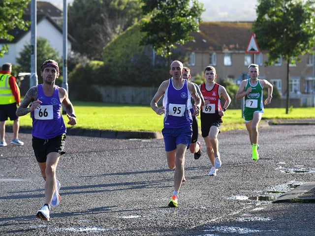 Foyle Valley's Sean O'Donnell (66) and Gary Brady (95), Spartans Aidan Healy (69) and Mark Tourish (7) Rise Running Club. Photo: George Sweeney