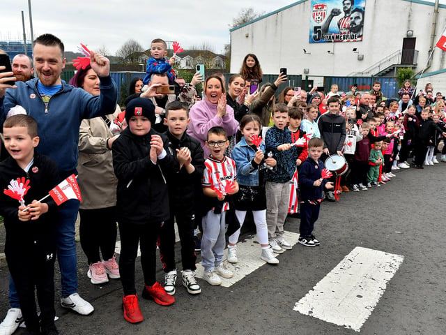 Derry City fans at the Brandywell Stadium on Saturday morning prior to the team’s departure for Dublin ahead of Sunday’s FAI Cup Final against Drogheda United. Photograph: George Sweeney