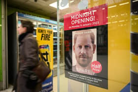 A poster advertising the launch of Prince Harry's memoir, Spare, on sale from today, is seen in a shop window (Picture: Leon Neal/Getty Images)