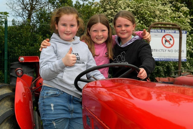 Briona, Erin and Lucy, from Muff, pictured at the Muff Vintage Show held in the Community Park on Sunday. Photo: George Sweeney.  DER2321GS – 13 