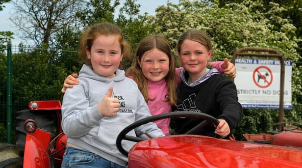 Briona, Erin and Lucy, from Muff, pictured at the Muff Vintage Show held in the Community Park on Sunday. Photo: George Sweeney.  DER2321GS – 13 