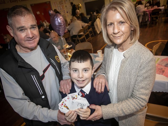 Young Jake Logue pictured with grandparents at Holy Child. : .