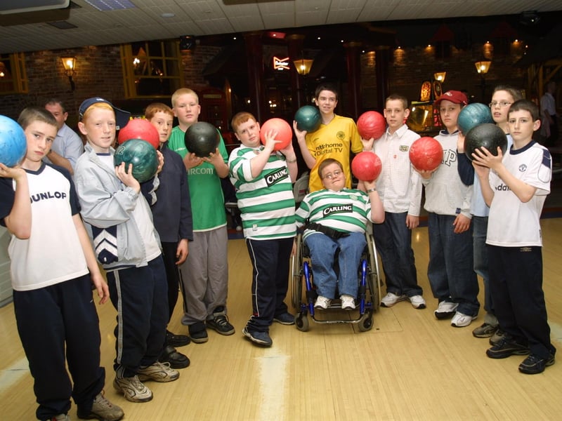 Patrick and the boys line up for a game of bowls.
