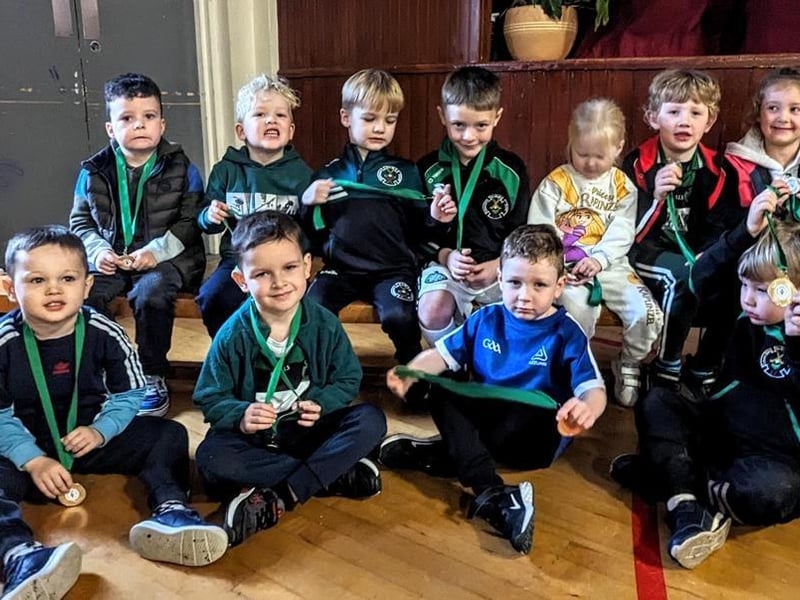 These youngsters show off their medals at the annual Na Magha presentation night.