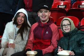 Candystripe fans at the Brandywell for Friday evening’s game. Photo: George Sweeney