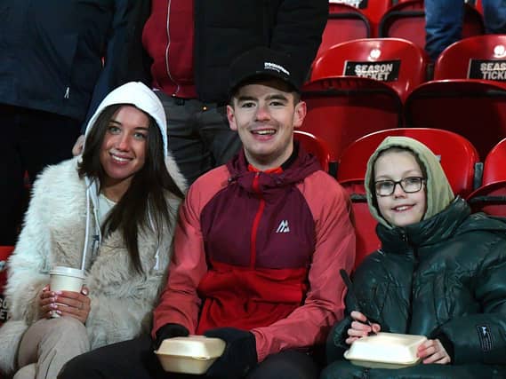Candystripe fans at the Brandywell for Friday evening’s game. Photo: George Sweeney