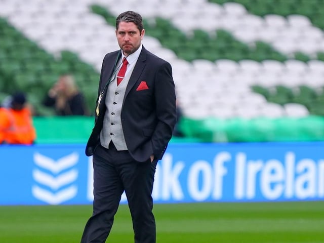 Derry City manager Ruaidhri Higgins, suited and booted before kick-off.