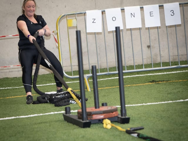 This competitor shows off her rope pulling strength on Sunday.