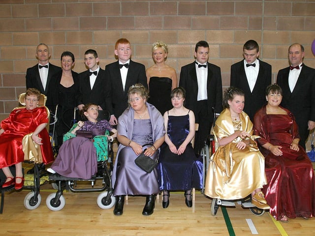 Guests attending the Foyle View Special School's inagural formal held at Pitchers. From left (seated), are Sarah O'Donnell, Charlene Ryan, Christina Cresswell, Susan Hancock, Patricia Fleming and Laura Holmes. Back row, teachers Dan Burns and Harriett Glove, with Christopher Watson, Aiden McCormick, Alison January, classroom assistant, Cathal O'Kane, Kevin Quinn and Ross Laird, teacher in the senior department. (0112T03).:.
