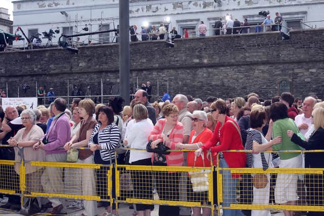 Part of the crowd and world's media gathered at Guildhall Square in Londonderry for the release of the Lord Saville Report on 'Bloody Sunday'. LS2410-517MT.