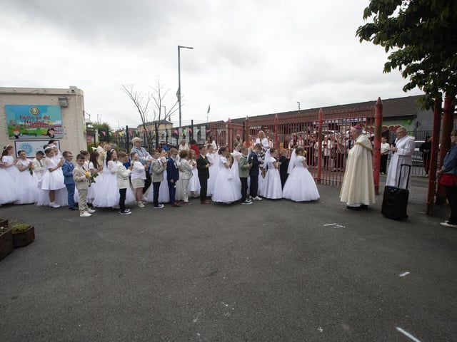 Bishop Donal McKeown starts the Rosary before moving from the gates before starting Thurday's May Procession at Holy Child PS to St. Mary's Church, Creggan.
