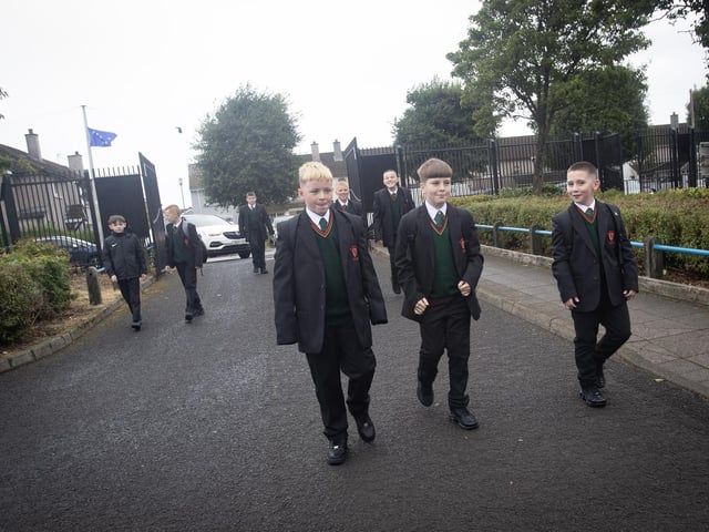 New Year 8 students at St. Joseph's Boys School make their way through the gates on Monday morning. : St. Joseph's Boys School welcomes latest influx of Year 8 pupils