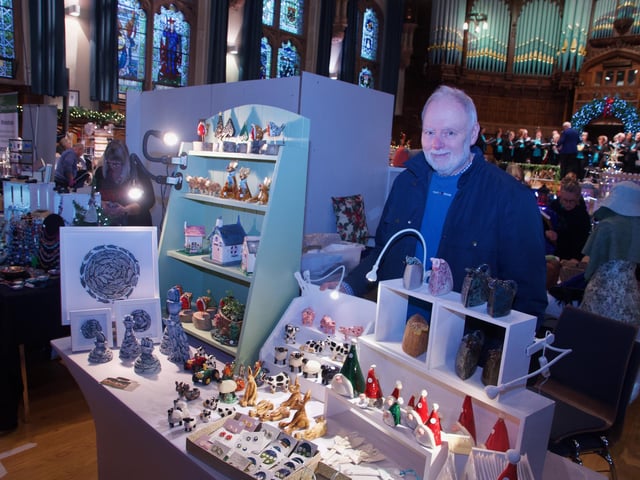 Trevor Woods with his art on display.