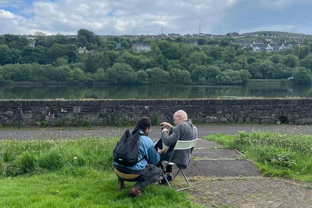 Adrián Balseca filming ‘Nyctalopia’ (2024) with Eamonn McCann. Taken by Sinéad Feeney.