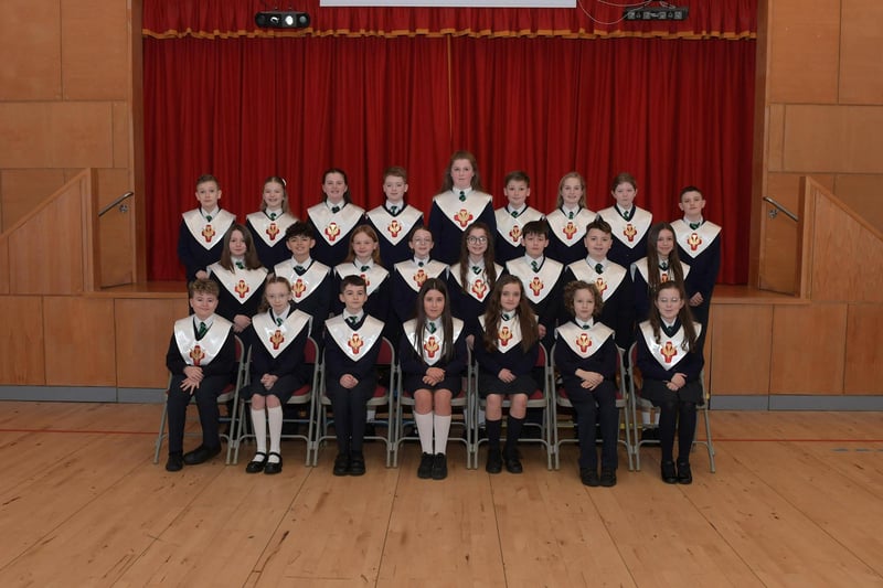 Mrs. P. Smith’s pupils from St Patrick’s Primary School who recently made their Confirmation at St Patrick’s Church in Pennyburn. Included in the photograph is Mr. J. Bradley (teacher).  Photo: George Sweeney