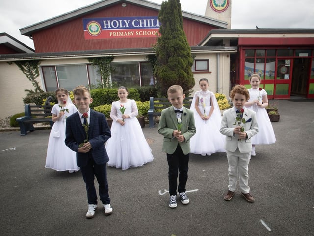 MAY PROCESSION. . . . .Holy Child PS First Holy Communion pupils Jamie, Caiden, Jacob, Lacey, Lailah and Farragh pictured before the school's May Procession with Bishop Donal McKeown to St. Mary's Church on Thursday morning. (Photos: Jim McCafferty Photography)