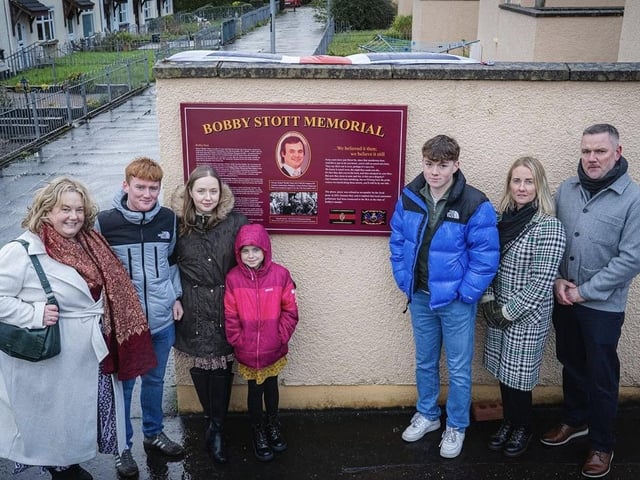 The family, friends and former band mates of Bobby Stott at the unveiling of a plaque in his memory on Sunday.