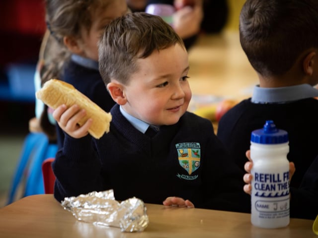 Mrs. Harkin's P1 pupil Teddy gets ready to tuck in.