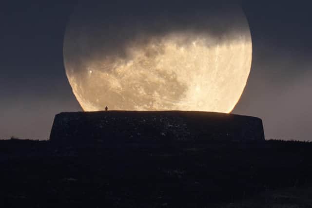 Patryk Sadowski, from Kingsmere Gardens, Derry City has been shortlisted in the ‘Back on Earth - Landmark’ category for his image ‘Pink Moon Rising over Grianán’