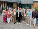 Sinn Féin Vice-President Michelle O'Neill with the 13 of the party's new councillors and Ciara Ferguson, MLA.