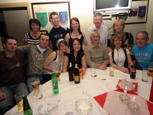 Michael surrounded by party revellers at the City of Derry golf club 0029/JML : Parties and celebrations January 2006: Michael Rankin.