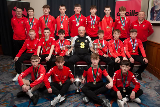 Joe Doherty, IFA Senior Coach, presenting the 2008 League Trophy, Summer Cup and Winter Cup to Tristar FC, at the Annual Awards in the City Hotel on Friday night last. Included are coaches Paddy Morrison and Noel Coyle. (Photos: Jim McCafferty)