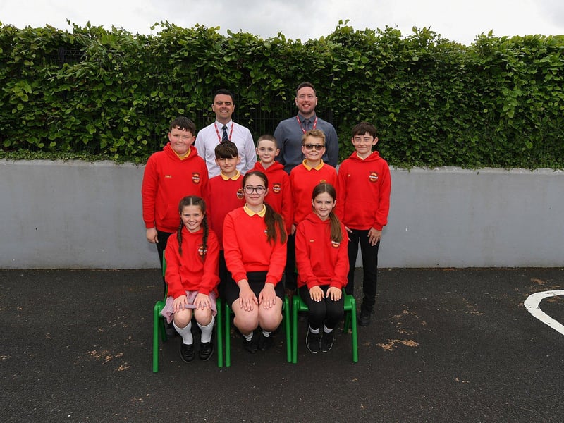 Mr O’Kane, principal and Mr Kane, teacher, pictured with Ballougry Primary School’s P7 class.