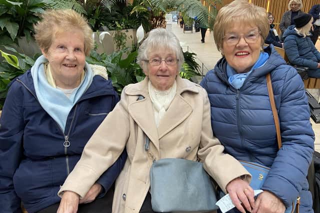Friends Margaret Melarky, Kathleen Carr and Anna Cassidy enjoying performances from Lilliput Theatre Company and the U3A Ukelele Band at Waterside Train Station