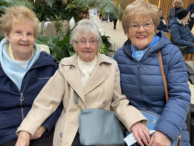Friends Margaret Melarky, Kathleen Carr and Anna Cassidy enjoying performances from Lilliput Theatre Company and the U3A Ukelele Band at Waterside Train Station