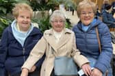 Friends Margaret Melarky, Kathleen Carr and Anna Cassidy enjoying performances from Lilliput Theatre Company and the U3A Ukelele Band at Waterside Train Station