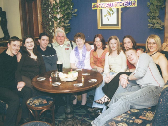 Angela Cox with her husband Jim and members of her family circle pictured at the Argyle Arms