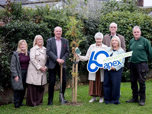 A native tree was planted at Fr Mulvey Park in Derry by Apex Chairperson, Liam Hannaway, accompanied by Chief Executive Sheena McCallion. Also pictured, Fr Mulvey Park tenants Maureen and Joe; Ellen Hall and Cathy McCallion from Apex's sheltered housing team and Dermot Campbell from Apex's estates team.