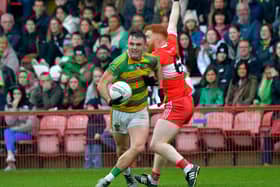 Glenullin ‘s Eoin Bradley holds off Drumsurn's Dara Rafferty during the IFC final at Celtic Park on Sunday afternoon last.   Photo: George Sweeney.  DER2243GS – 041