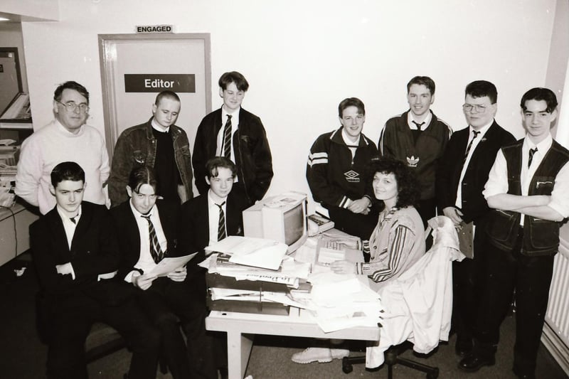 Derry Journal deputy editor, the late Siobhan McEleney with pupils and staff from St Brecan's School during their trip to the Journal offices in Buncrana Road.