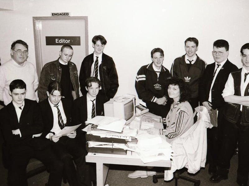 Derry Journal deputy editor, the late Siobhan McEleney with pupils and staff from St Brecan's School during their trip to the Journal offices in Buncrana Road.