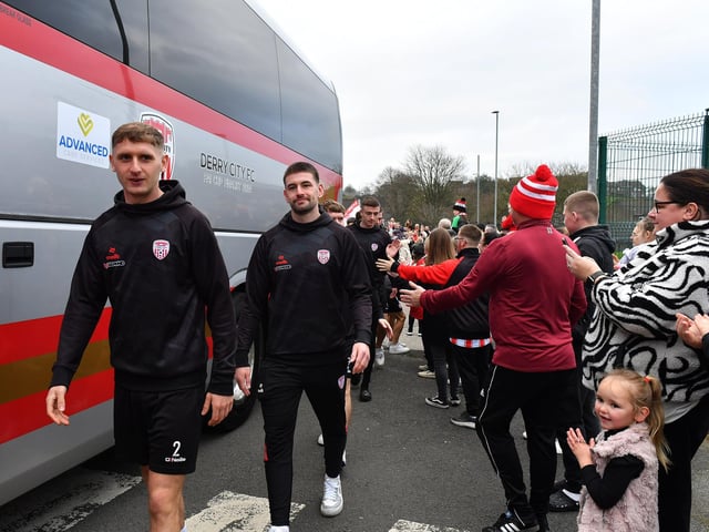 Derry City players greet fans gathered at Brandywell Stadium on Saturday morning prior to their departure for Dublin ahead of Sunday’s FAI Cup Final against Drogheda United. Photograph: George Sweeney.