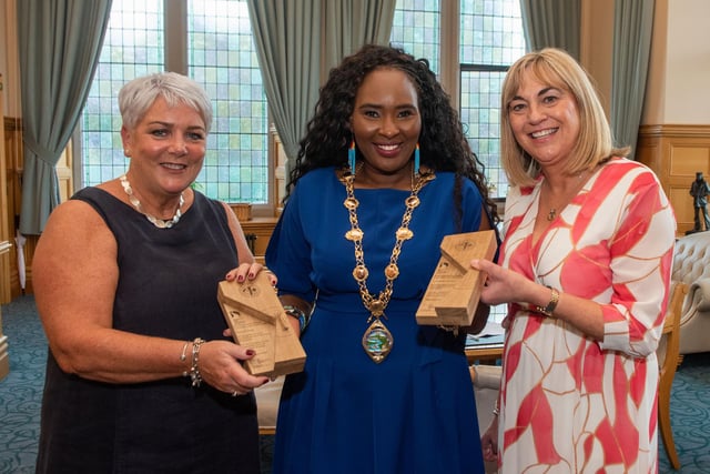 The Mayor Councillor Lilian Seenoi-Barr pictured with, Karen Boyd, St Thérèse's Primary School and Michelle Ramsey who was Principal of the Model Primary School during a reception to mark their retirement from teaching. Picture Martin McKeown. 28.08.24