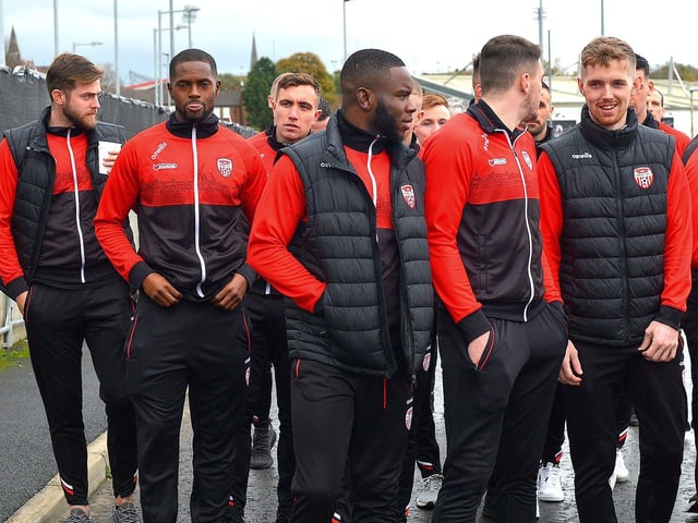 Derry City players and staff on their way to greet fans gathered at Brandywell Stadium on Saturday morning prior to their departure for Dublin ahead of tomorrow’s FAI Cup Final against Shelbourne. George Sweeney.  DER2244GS – 39