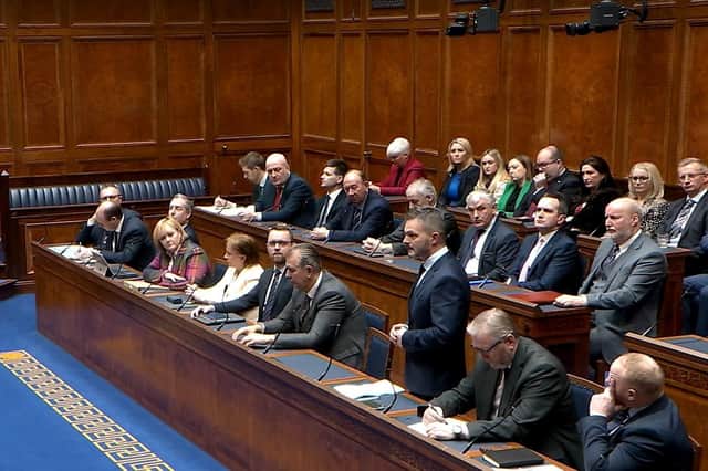 Members of the DUP listen to Ulster Unionist Party MLA Robbie Butler at the recall of the Stormont Assembly on Wednesday.