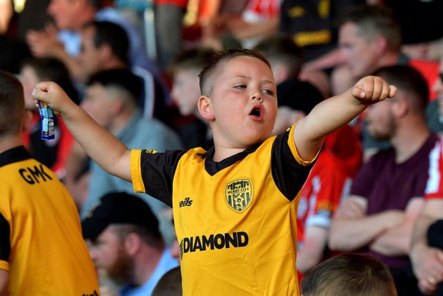 Young fan Braelin cheering on the Candystripes against Shelbourne in the Ryan McBride Brandywell Stadium. Photo: George Sweeney. DER2321GS - 79