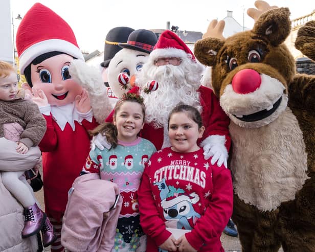 Santa, Elf on the Shelf and Rudolph entertain the children at Foyleside. Gerard Gormley Photography.
