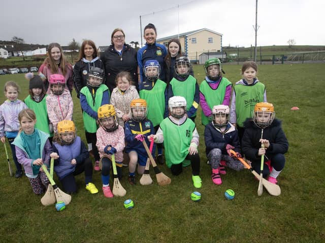 Beart coaches Niamh Devlin, Aoife Kerr, Grace Boyle, Karen McLaughlin and Sienna McLaughlin with the U8 camogs. (Photos by Jim McCafferty Photography)