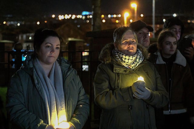 People carry candles at the procession and vigil for the children of Palestine at the Bloody Sunday Monument on Rossville Street. Photo: George Sweeney