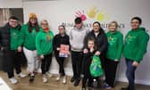 Members of Buncrana's Children's Charity with Chloe and Padraig.