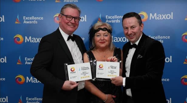 Licensees Alan and Val Rodden are presented with the Store of the Year Award and the Excellence in Community Engagement Award by Maxol CEO Brian Donaldson.