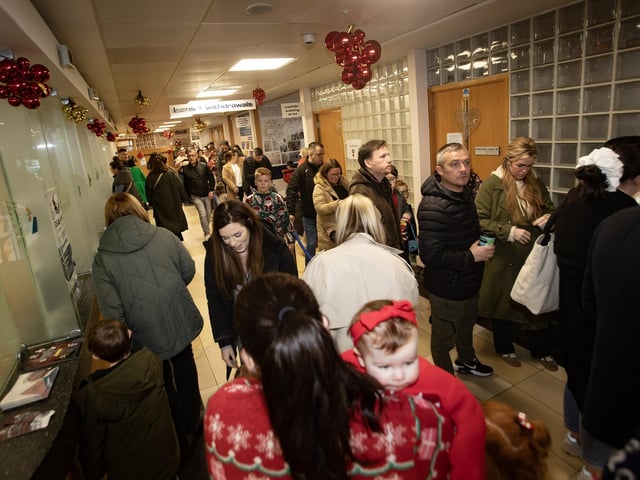 A very busy queue for Santa Claus at Derry Credit Union on Saturday. (Photos: Jim McCafferty Photography) : .