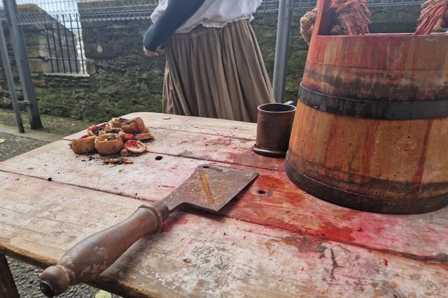 Props to represent the bucket of horse blood.