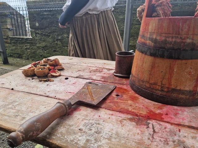 Props to represent the bucket of horse blood.